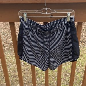 Tangerine black striped gym shorts